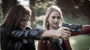 A group of women engaged in shooting activities